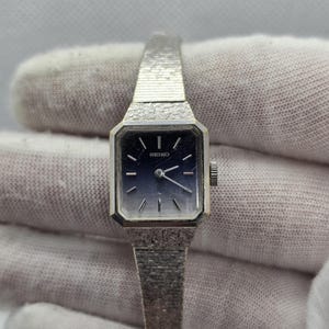 Vintage 1970s White Gold Plated Silver Ladies Tank Style Rectangular Blue Gradient Dial Manual Wind Up Wristwatch Bracelet Strap By Seiko