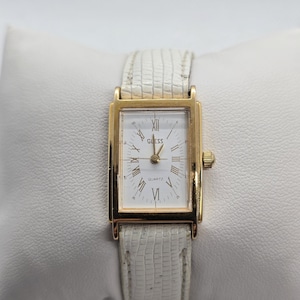 1989 Vintage Guess women’s Watch Roman Numeral Gold Tone Bezel w/White Dial $_12.JPG?set_id=880000500F main image 2