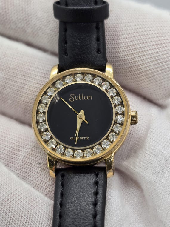 Strass Armbanduhr goldfarben, schwarzes Lederarmband, zierliches