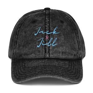May include: A black vintage washed cotton baseball cap with the text "Jack & Jill" embroidered in blue on the front.