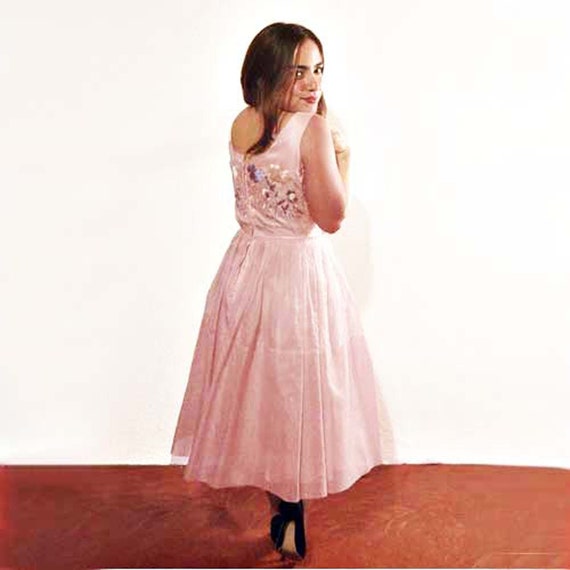 cotillion cocktail dress International Teen Model, Princess Jakosalem dazzled in her third ensemble  at her 18th Grand Cotillion de Honor, wearing a show-stopping cocktail dress  in an elegant pastel pink. The design featured a daring