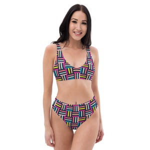 May include: A high-waisted bikini with a geometric pattern in pink, yellow, blue, and green on a black background.