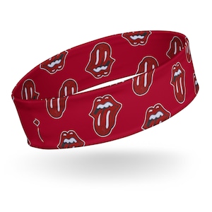 May include: Red headband with a repeating pattern of white and red lips with a tongue sticking out.