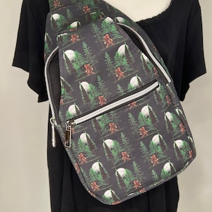 Moonlight Walk With Sasquatch Retro Sling Backpack