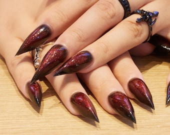 Uñas postizas de Halloween con garras rojas y negras, uñas postizas largas de vampiro con efecto stiletto, juego de uñas acrílicas estilo gótico punk, uñas reutilizables para cosplay y terror.