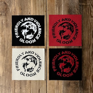 May include: Four square patches with the text "FRIENDLY AND VIOLENCE GLOOM" in a circular design. The patches are black, red, off-white, and black, each with a different color scheme for the text and graphic.