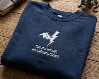 Onyx Storm Dancing Through The Lightning Strikes Embroidered Sweatshirt | Fourth Wing Dragon Shirt | Fantasy Reader Gift