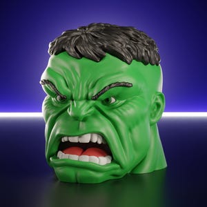 May include: A sculpted bust of the Hulk featuring bright green skin, a furrowed brow, and a wide, angry expression with visible white teeth and a red tongue. The character has short, textured black hair and a prominent, muscular jawline.