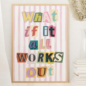 May include: A framed print with a pink and white striped background. The text "What if it all works out" is written in colorful, cut-out letters.