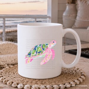 May include: A white ceramic mug with a colourful watercolour sea turtle design. The turtle has a pink head and flippers, with a green and blue shell. The mug is on a woven coaster. The text at the bottom says "Final files are delivered watermark free. Mockups are used for display and inspiration."