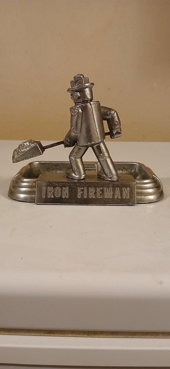 Vintage Iron Fireman Ashtray - Retro Metal Smoking Accessory