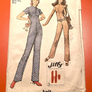 May include: Vintage Simplicity sewing pattern featuring two jumpsuit designs. The pattern includes a size 10 with a 32.5-inch bust. The cover art shows illustrations of the jumpsuits, with the text "Jiffy easy cut-easy sew" and "Designed for knit fabrics only."