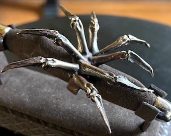 Anillo de araña de bronce