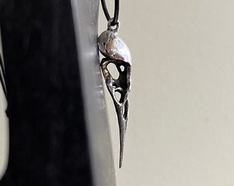 Colgante de calavera de pájaro de plata de ley
