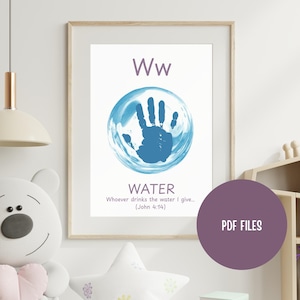 May include: A framed print featuring the letter "Ww" above a blue handprint inside a blue circle, with the word "WATER" below. The print includes a Bible verse and is part of a children's educational series.