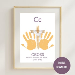 May include: Framed print featuring a wooden cross with a white cloth and two orange handprints. The word "CROSS" is below, with the text "For God so loved the world... (John 3:16)". The letter "Cc" is at the top. A purple circle says "DIGITAL DOWNLOAD".