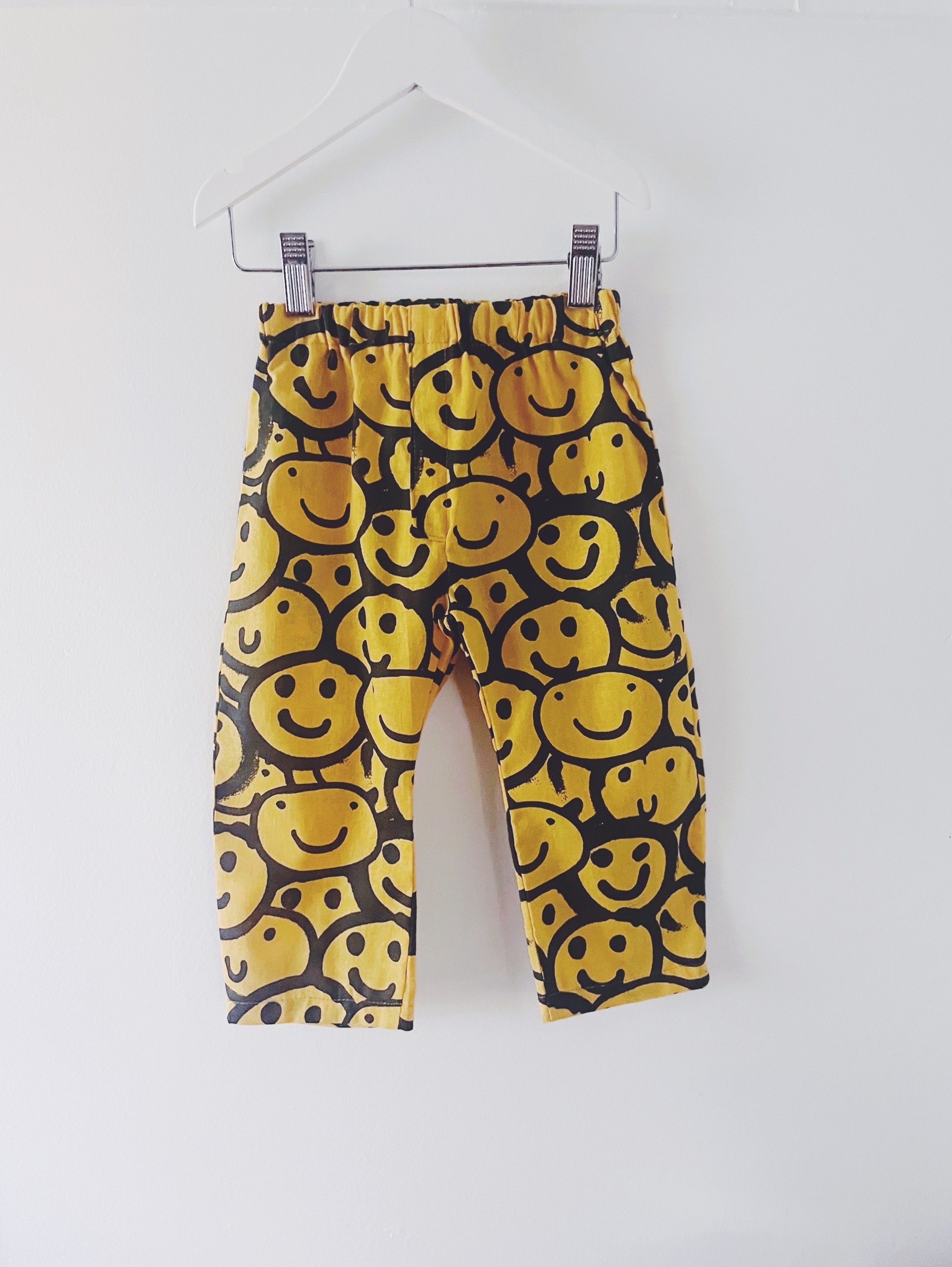 Smiley Face And Pants Emoji