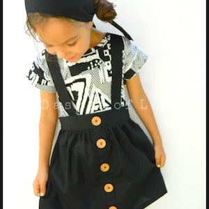 Black suspender skirt pinafore dress wood button details cottagecore kid style minimalist bohemian children clothing Halloween outfit girls