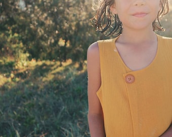 Summer top. Turmeric Paprika. Off centre wood button. Minimalist style. Girls beach top. Yellow top. 100% cotton.