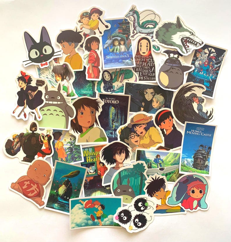 May include: A collection of colourful stickers featuring characters and scenes from popular Studio Ghibli films, including Totoro, Spirited Away, Howl's Moving Castle, and Kiki's Delivery Service.