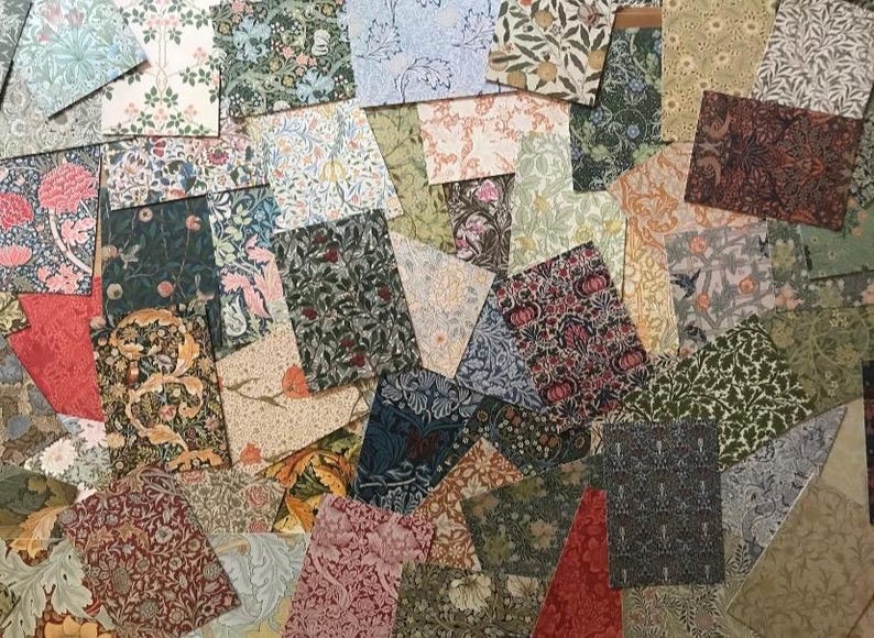 May include: A collection of patterned paper squares in various colors and designs, including floral, geometric, and abstract patterns. The papers are arranged in a random pattern, creating a visually interesting and textured surface.
