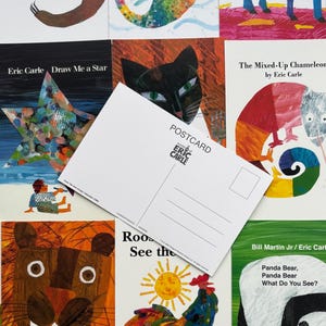 May include: A collection of children's books and a postcard featuring illustrations by Eric Carle. The books showcase colorful animal illustrations, including a cat, a chameleon, and a panda bear. The postcard has the text "POSTCARD" and "world of Eric Carle".