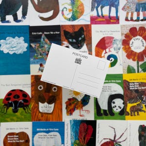 May include: A collection of colorful children's book covers and postcards by Eric Carle. The covers feature illustrations of animals, including a gorilla, sloth, seahorse, and horse. A blank postcard with the Eric Carle logo is in the foreground.