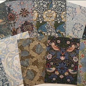 May include: A collection of 12 patterned fabric squares featuring floral and bird designs in shades of blue, green, and brown. The fabric squares are arranged in a grid pattern.