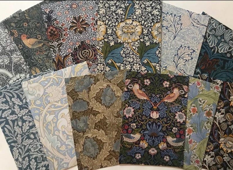 May include: A collection of 12 patterned fabric squares featuring floral and bird designs in shades of blue, green, and brown. The fabric squares are arranged in a grid pattern.