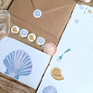 Set de papelería de La Sirenita: Papel de escribir costero pintado a mano con ilustraciones oceánicas y sellos de lacre veganos hechos a mano.