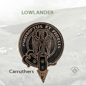 May include: A black and gold Scottish clan crest with the text "PROMPTUS ET FIDELIS" around the outside. The crest features a bird with wings spread and a sword. The text "Carruthers" is below the crest.