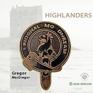 May include: A bronze-colored Scottish clan crest with the words "S Rioghal Mo Dhream" around the edge. The crest features a lion with a crown and the words "HIGHLANDERS" are displayed above the crest.