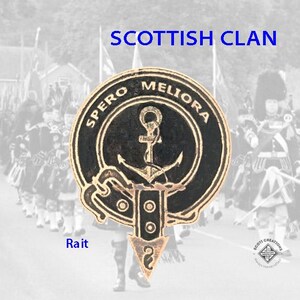 May include: A gold Scottish clan crest with a black background and the words "Spero Meliora" in gold lettering. The crest features an anchor and a sword. The clan name "Rait" is written in blue below the crest.