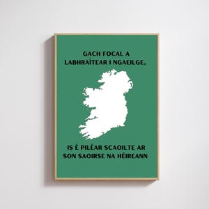 May include: A green poster with a white outline of Ireland. The text reads "GACH FOCAL A LABHRAÍTEAR I NGAEILGE, IS É PILÉAR SCAOILTE AR SON SAOIRSE NA HÉIREANN".