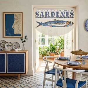 May include: A beaded curtain featuring the word SARDINES in dark blue block letters above a detailed graphic of a single sardine in shades of blue, silver, and orange, hanging in a doorway with a scalloped bottom edge design.