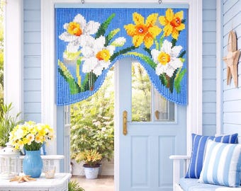 May include: A blue beaded door curtain with a floral design of white and yellow daffodils. The curtain hangs in a doorway, with a light blue door and white trim. The scene is bright and airy, with a coastal theme.