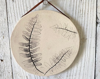 Botanical ceramic wall hanging with fern imprint, a rustic pottery wall hanging for farmhouse decor