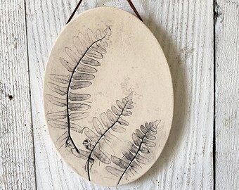 Botanical ceramic wall hanging with fern imprint, a rustic pottery wall hanging for farmhouse decor