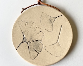 Botanical ceramic wall hanging