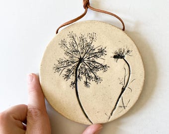 Botanical ceramic wall hanging
