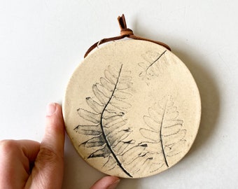 Botanical ceramic wall hanging with fern imprint, a rustic pottery wall hanging for farmhouse decor