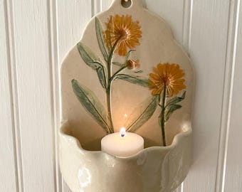 Botanical tea light luminary, a ceramic wall hanging candle holder with Calendula imprint for farmhouse decor