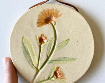 Botanical ceramic wall hanging
