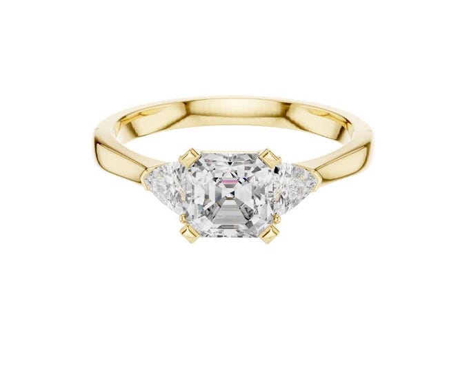 Emerald Cut Moissanite Engagement Ring: 14K Yellow Gold Trillion Side Stones