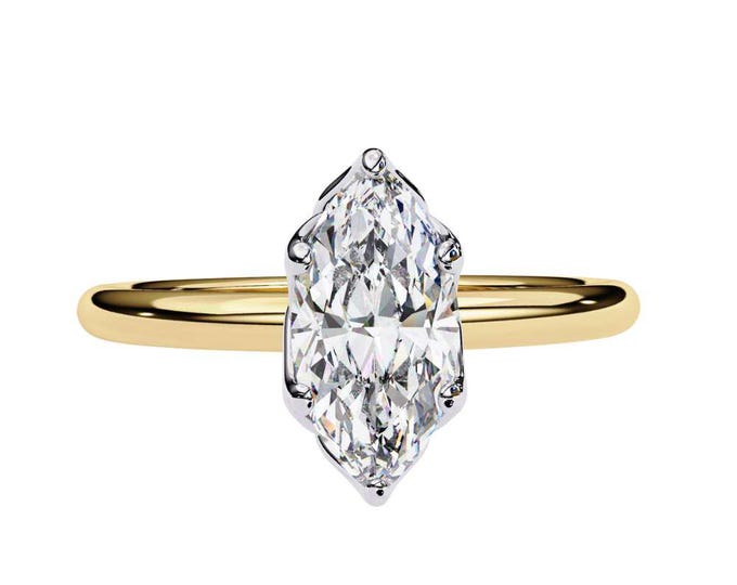 Expertly Set in a Classic and Refined Marquise Gold Band Showcasing Brilliant Sparkle and Sophisticated Design for a Truly Enduring
