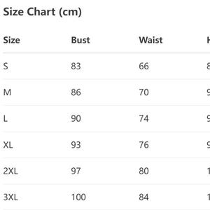 May include: A size chart in a table format, with the title "Size Chart (cm)". The chart includes sizes S, M, L, XL, 2XL, and 3XL, with corresponding bust, waist, and hips measurements in centimeters.