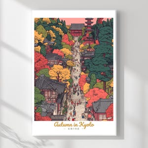 May include: An art print of a Japanese street scene in autumn. The illustration features a long pathway lined with buildings and trees in shades of red, yellow, and green. The text "Autumn in Kyoto" is at the bottom.