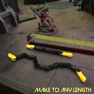 Chain style segmented ruler for accurate movement in tabletop games like 40k or Dungeons
