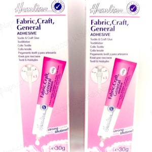 May include: Two packages of Hemline Fabric, Craft, General Adhesive, each containing a 30g tube of glue. The packaging is pink and white with the Hemline logo and product information.