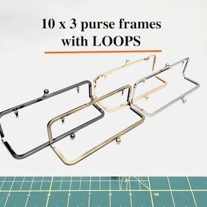 May include: A collection of purse frames in various metallic finishes, including black, gold, and silver. The frames are rectangular with loops for attaching to fabric. Text at the top reads "10 x 3 purse frames with LOOPS."